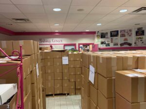 Pallets of stacked boxes for the virtual project management deliverable