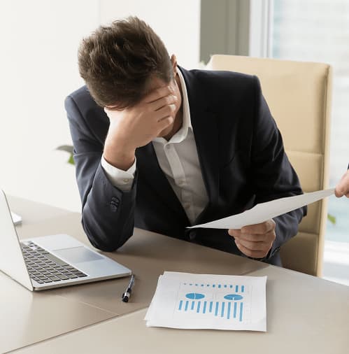 image of a stressed business owner who needs virtual small business consulting services